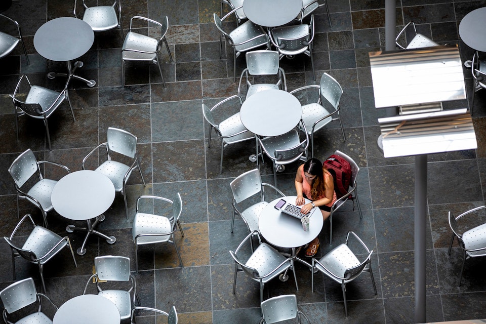 Students sitting at table on the University of Washington campus