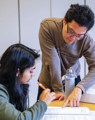 UW student being mentored by faculty.